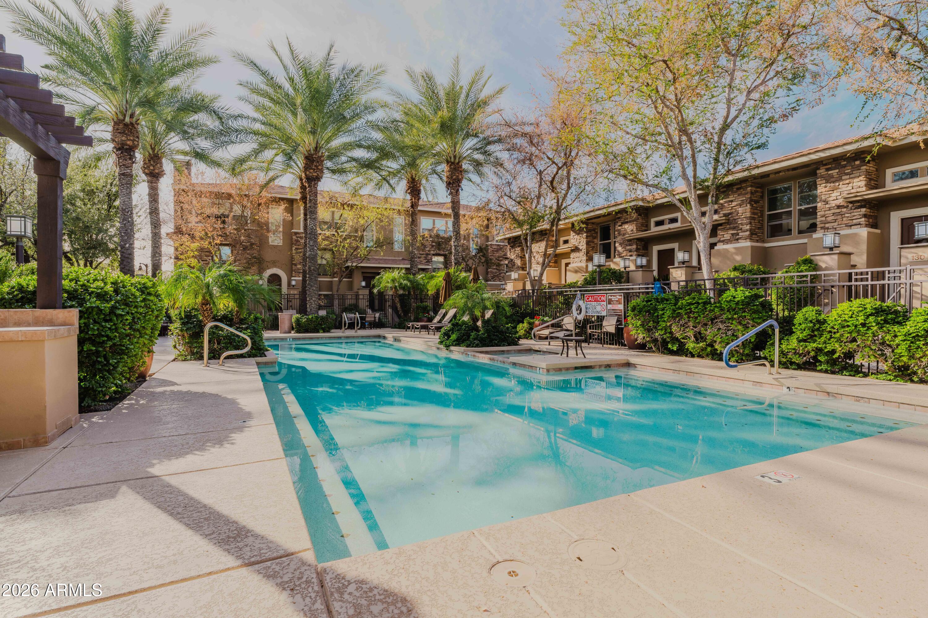 5550 North 16th Street, Unit 131 Phoenix, AZ 85016 - Photo 18 of 25 a view of a backyard with a patio