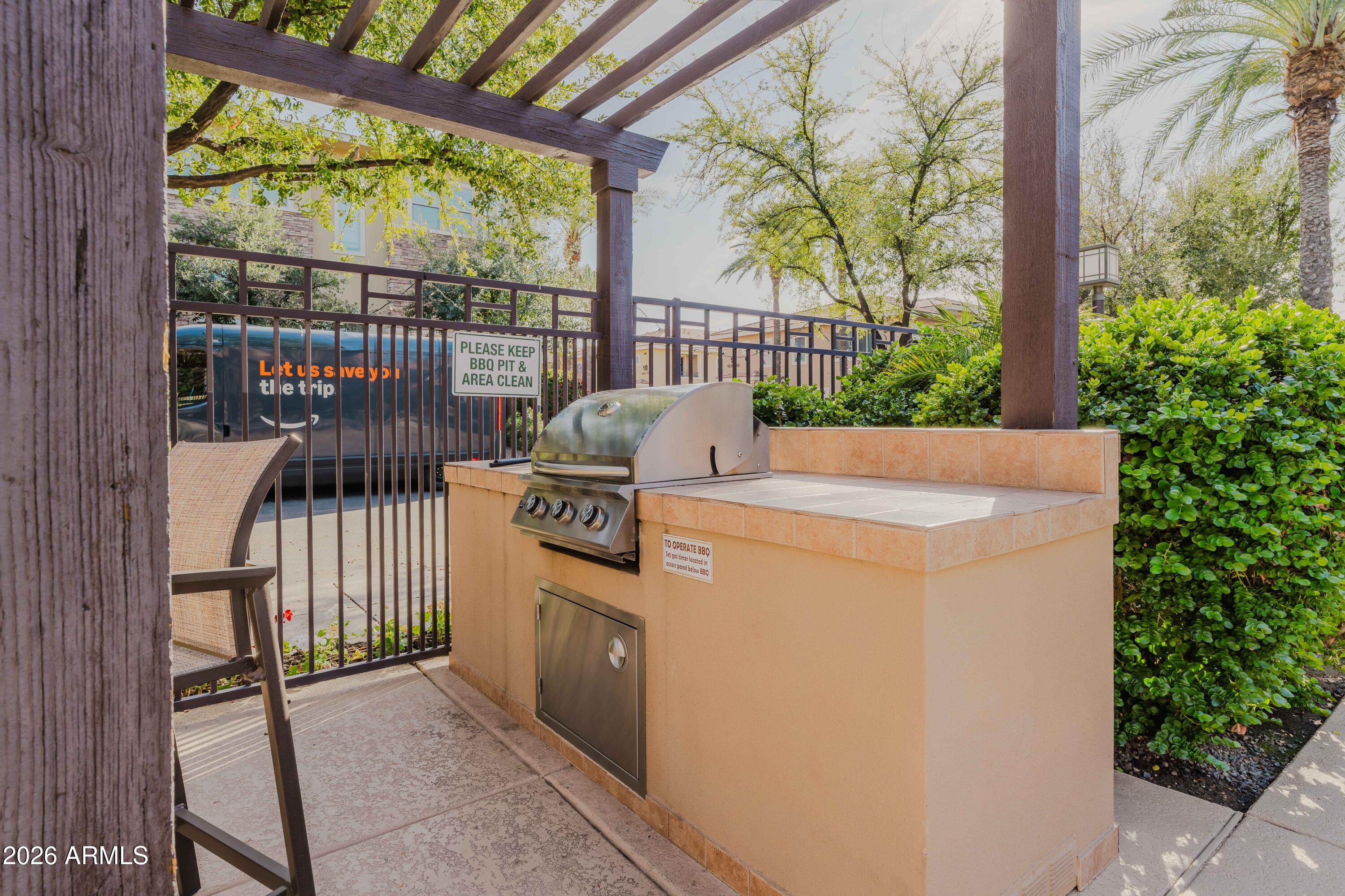 5550 North 16th Street, Unit 131 Phoenix, AZ 85016 - Photo 19 of 25 a view of outdoor space and barbecue grill