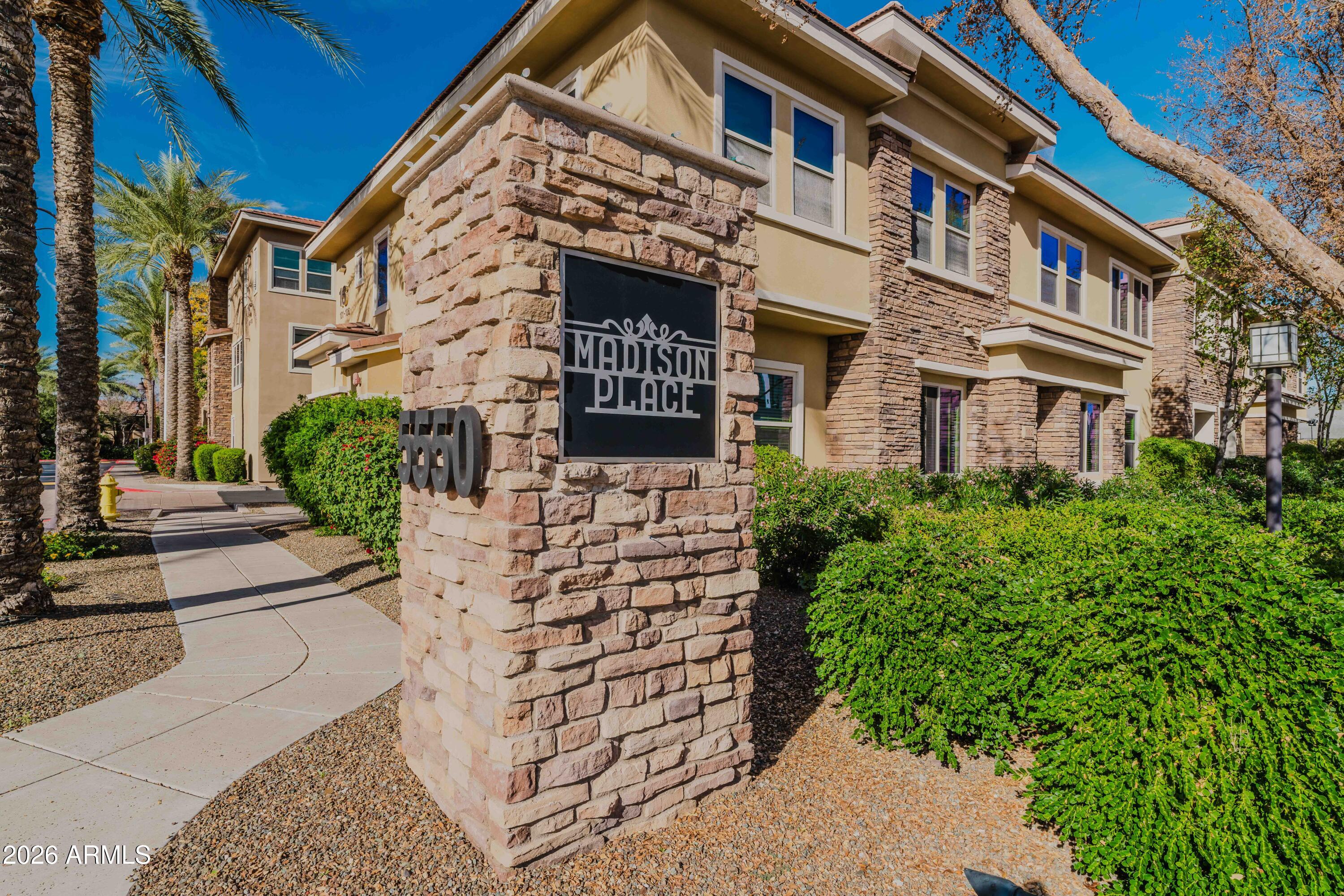 5550 North 16th Street, Unit 131 Phoenix, AZ 85016 - Photo 24 of 25 a front view of a building with garden