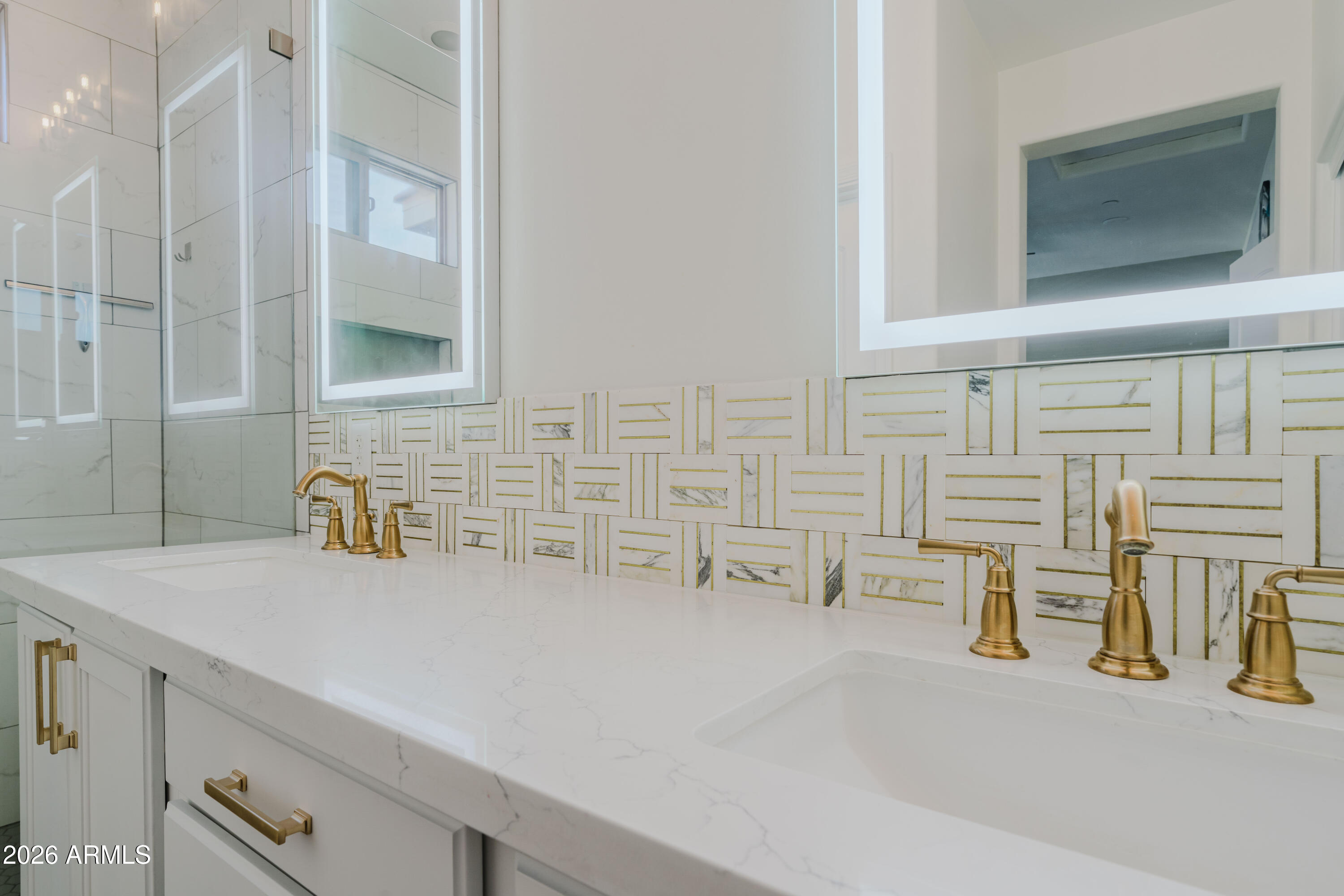 5550 North 16th Street, Unit 131 Phoenix, AZ 85016 - Photo 7 of 25 a bathroom with a sink and a mirror
