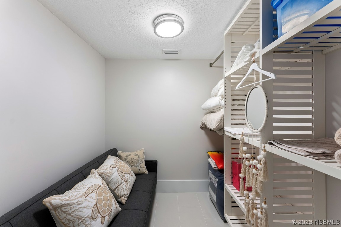 4650 Links Village Drive, Unit A301 Ponce Inlet, FL 32127 - Photo 26 of 54 a view of storage and utility room