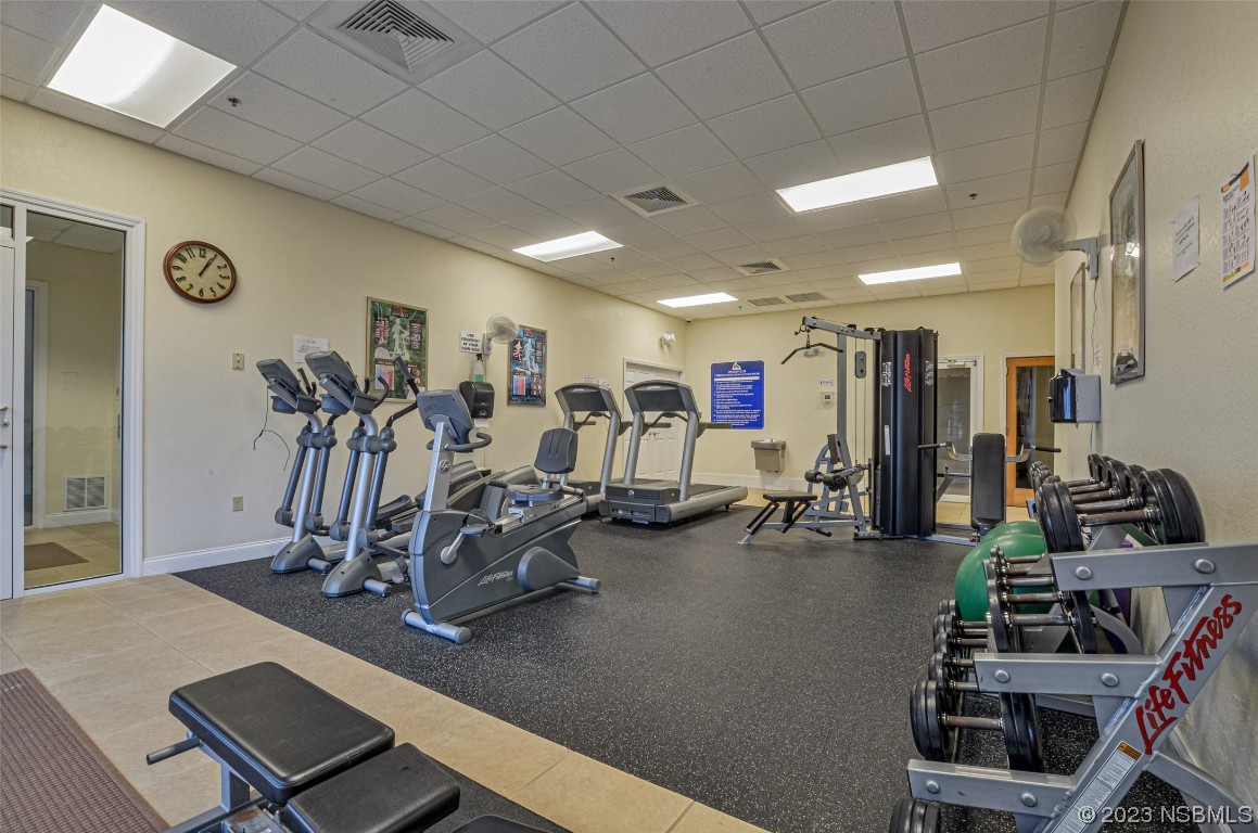 4650 Links Village Drive, Unit A301 Ponce Inlet, FL 32127 - Photo 33 of 54 a view of a room with gym equipment