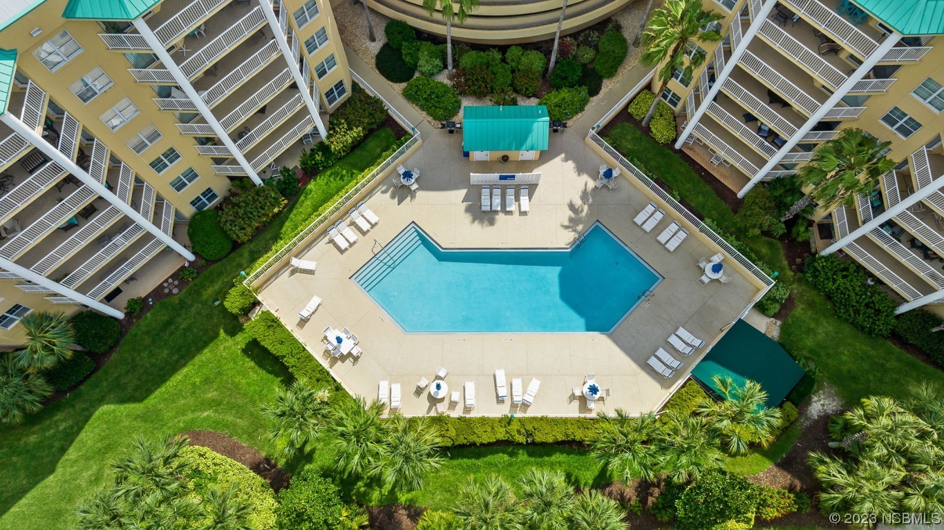 4650 Links Village Drive, Unit A301 Ponce Inlet, FL 32127 - Photo 38 of 54 an aerial view of a house with garden space and street view