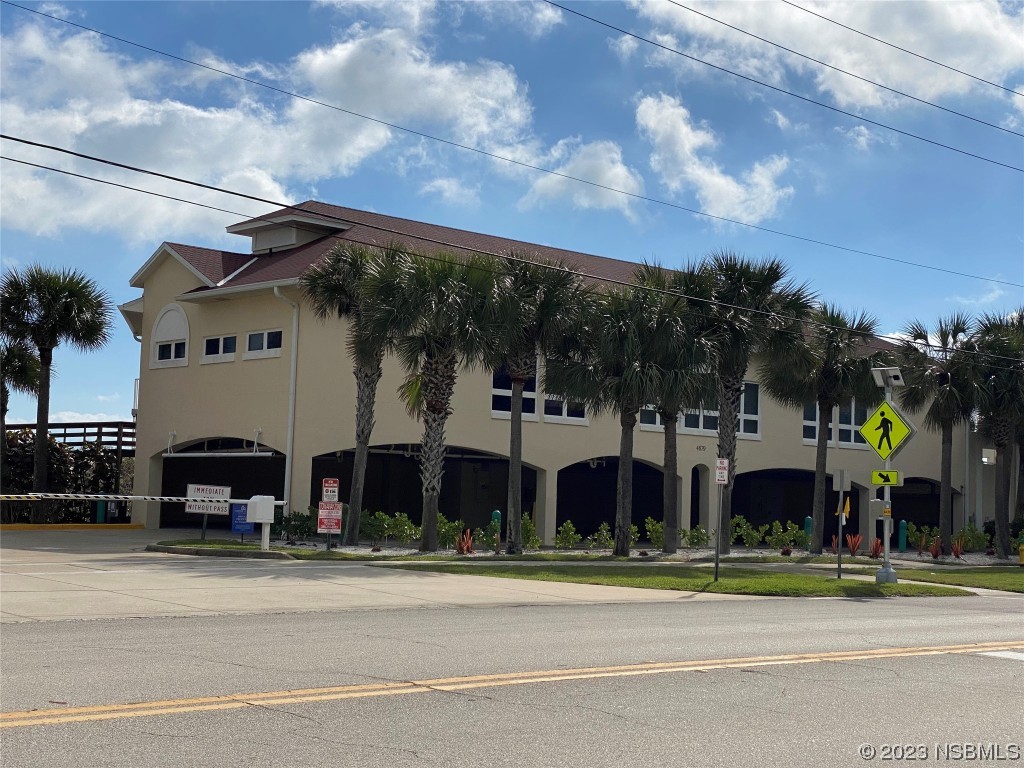 4650 Links Village Drive, Unit A301 Ponce Inlet, FL 32127 - Photo 40 of 54 a view of a food mall next to a building