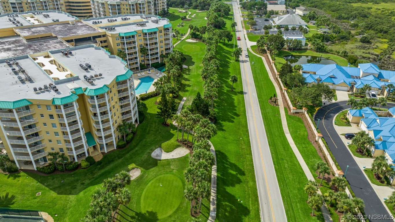 4650 Links Village Drive, Unit A301 Ponce Inlet, FL 32127 - Photo 50 of 54 a view of an outdoor space