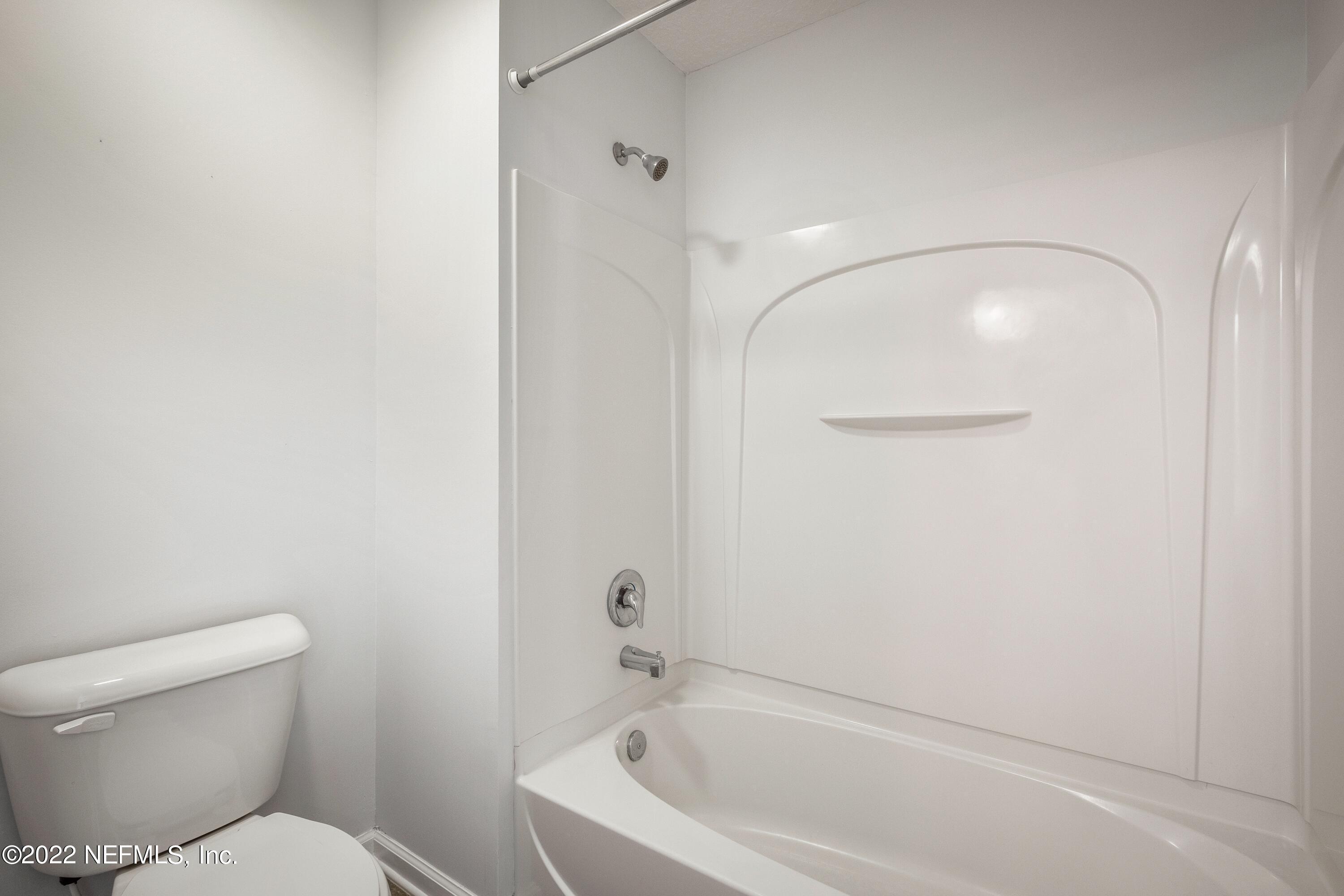 157 Heron Landing Road St. Johns, FL 32259 - Photo 31 of 40 a bathroom with a toilet and a shower