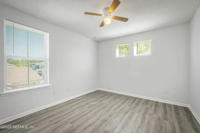 a view of a room with a large window