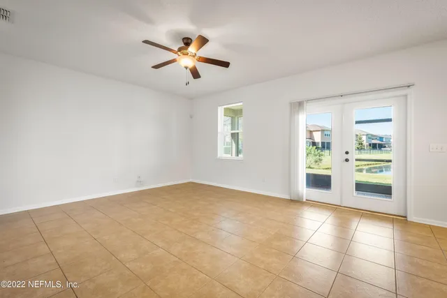 an empty room with windows