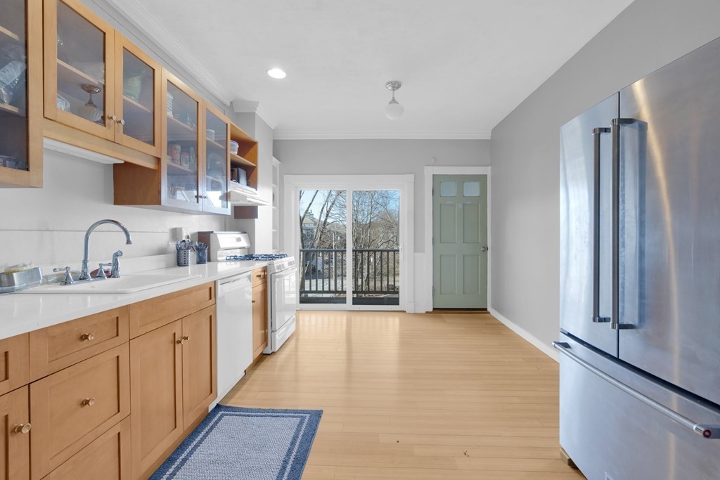 201 High Street, Unit 3 Brookline, MA 02445 - Photo 6 of 14 a large kitchen with cabinets