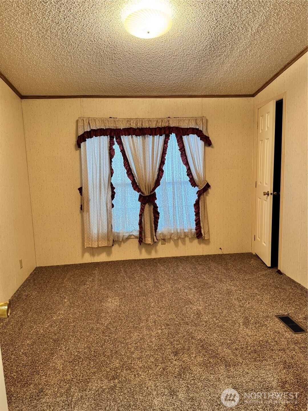 2388 Sparrow Loop, Unit 155 Kelso, WA 98626 - Photo 16 of 22 a view of wooden wall