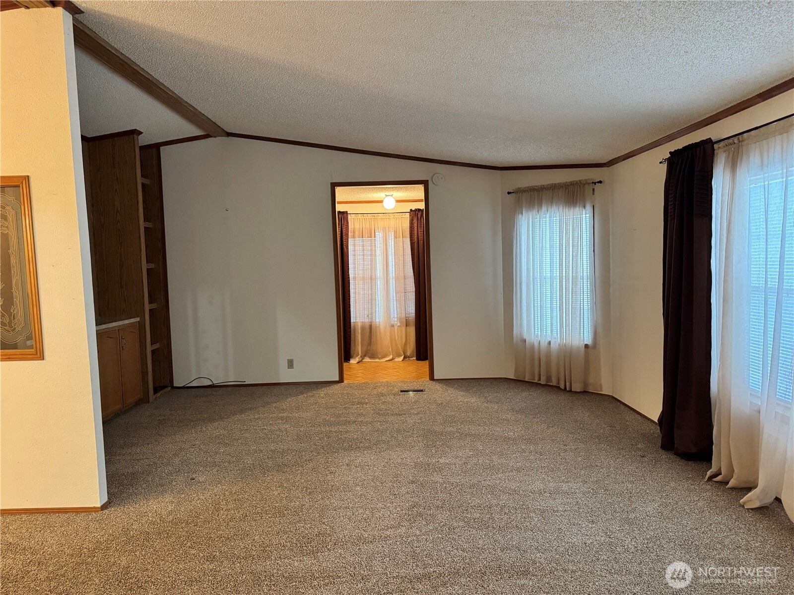2388 Sparrow Loop, Unit 155 Kelso, WA 98626 - Photo 19 of 22 an empty room with windows and closet