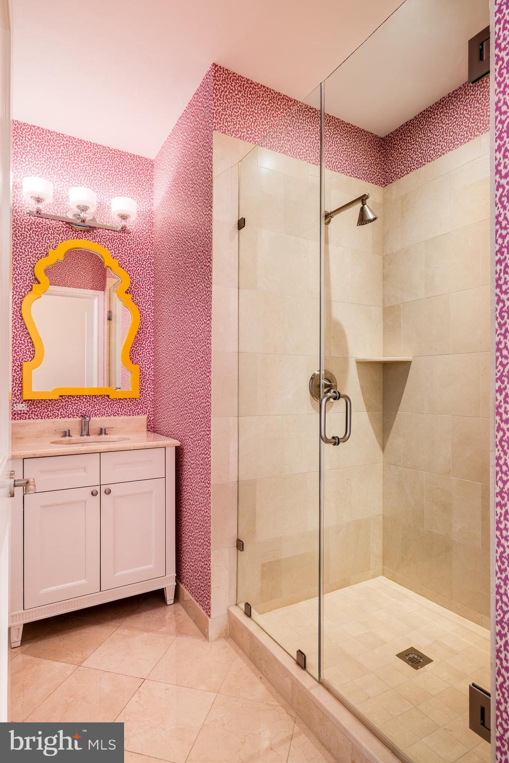 130 South 18th Street, Unit 1804 Philadelphia, PA 19103 - Photo 26 of 36 a bathroom with a mirror sink and vanity