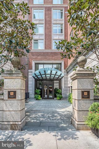 a view of a building with a street