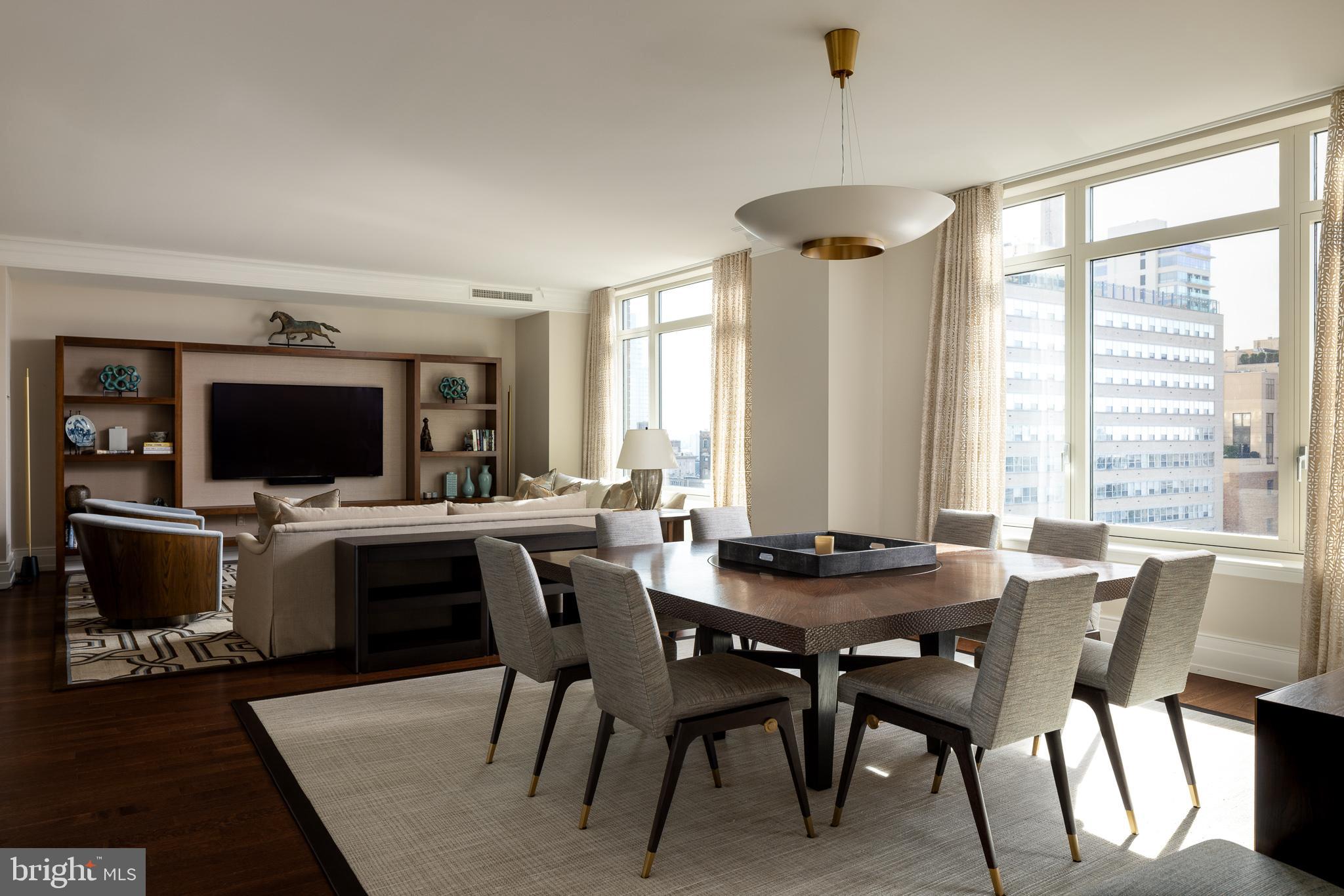 130 South 18th Street, Unit 1804 Philadelphia, PA 19103 - Photo 3 of 36 a dining room with furniture and window