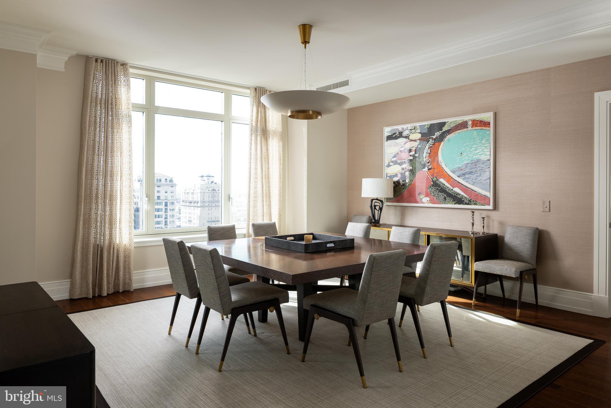130 South 18th Street, Unit 1804 Philadelphia, PA 19103 - Photo 4 of 36 a view of a dining room with furniture window and wooden floor