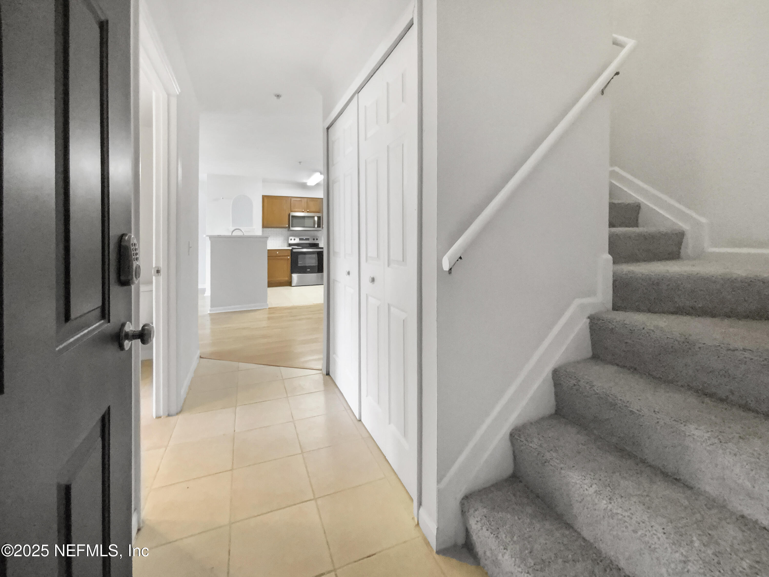 8550 Touchton Road, Unit 635 Jacksonville, FL 32216 - Photo 15 of 25 a view of entryway and hall with a couch