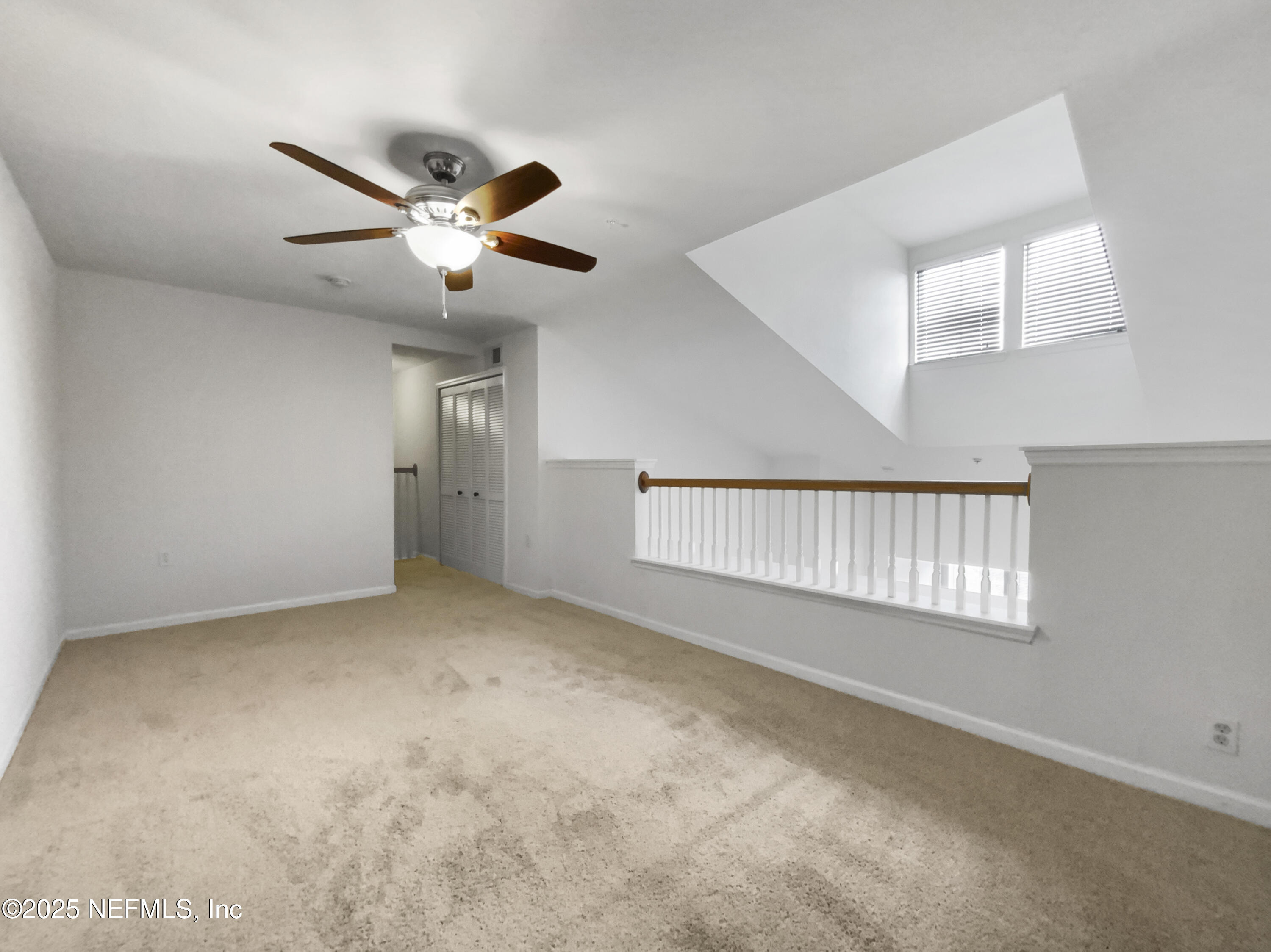 8550 Touchton Road, Unit 635 Jacksonville, FL 32216 - Photo 18 of 25 a view of an empty room with a window