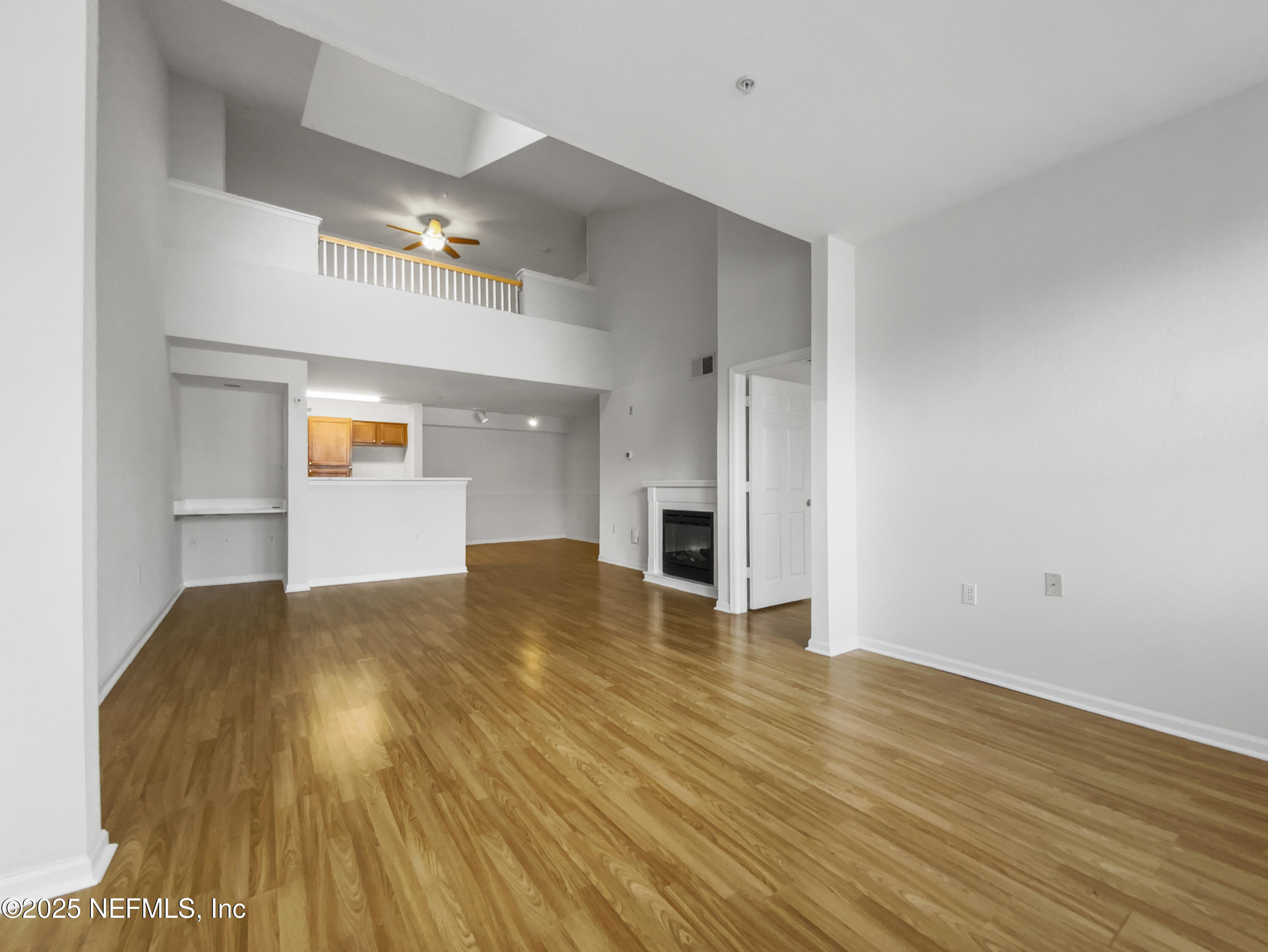 8550 Touchton Road, Unit 635 Jacksonville, FL 32216 - Photo 6 of 25 a view of empty room with wooden floor