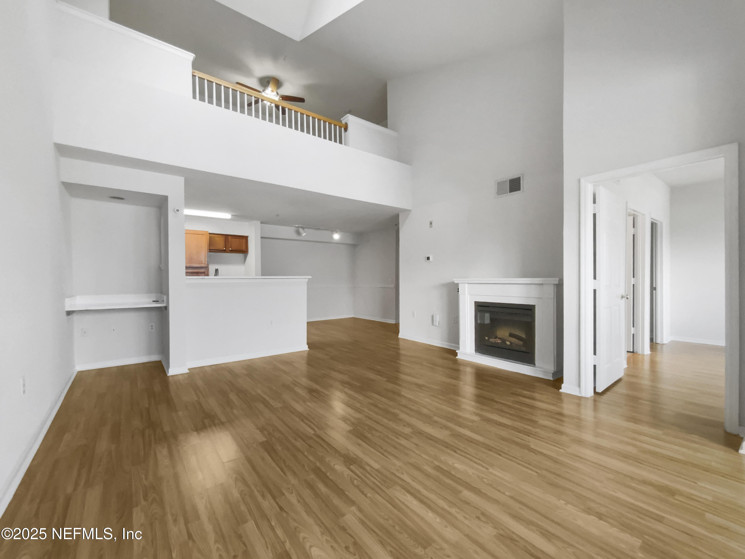 8550 Touchton Road, Unit 635 Jacksonville, FL 32216 - Photo 7 of 25 a view of empty room with wooden floor