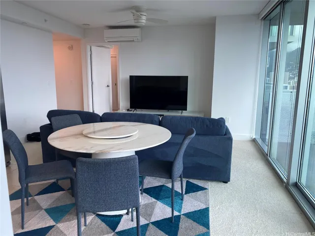 a view of a dining room with furniture