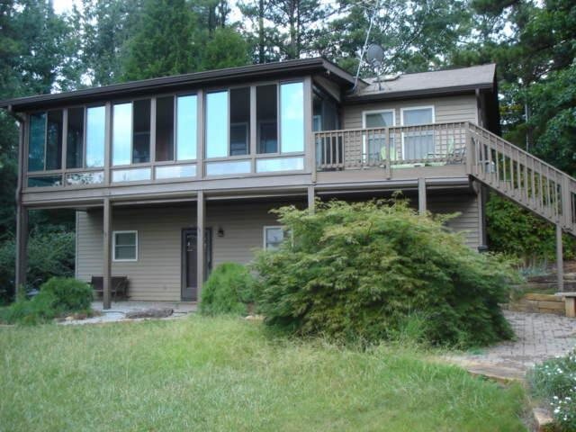 67 Thomas Brown Road Newnan, GA 30263 - Photo 1 of 1 a house view with a garden space