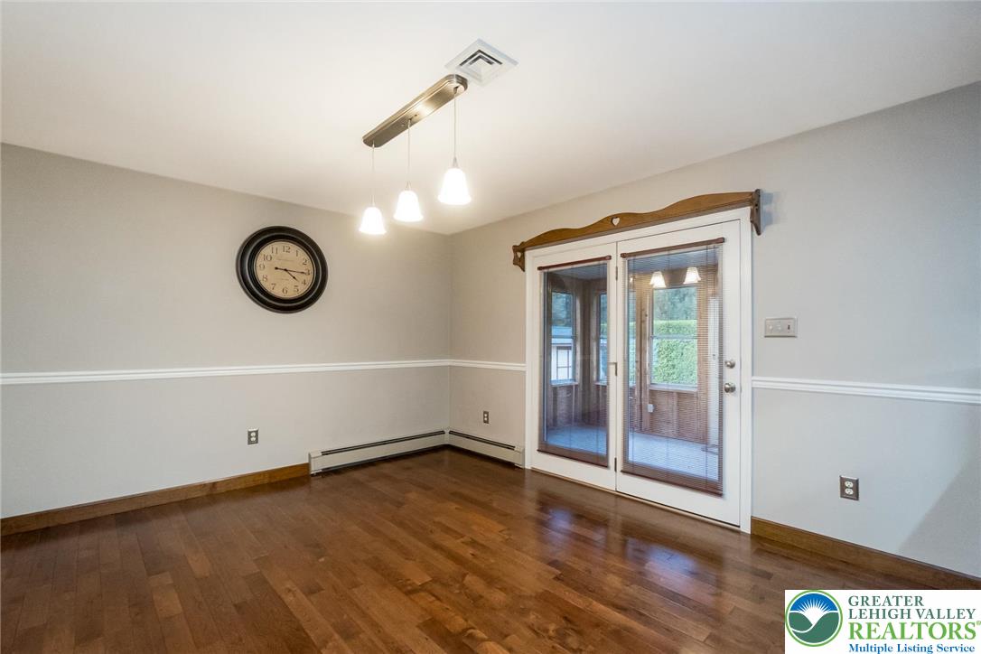 1053 Hilltop Road Leesport, PA 19533 - Photo 14 of 46 a view of a room with wooden floor