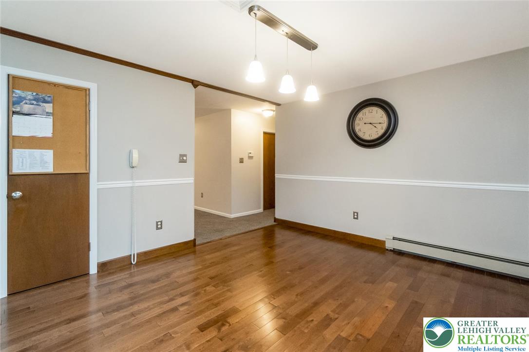 1053 Hilltop Road Leesport, PA 19533 - Photo 15 of 46 a view of an empty room and wooden floor
