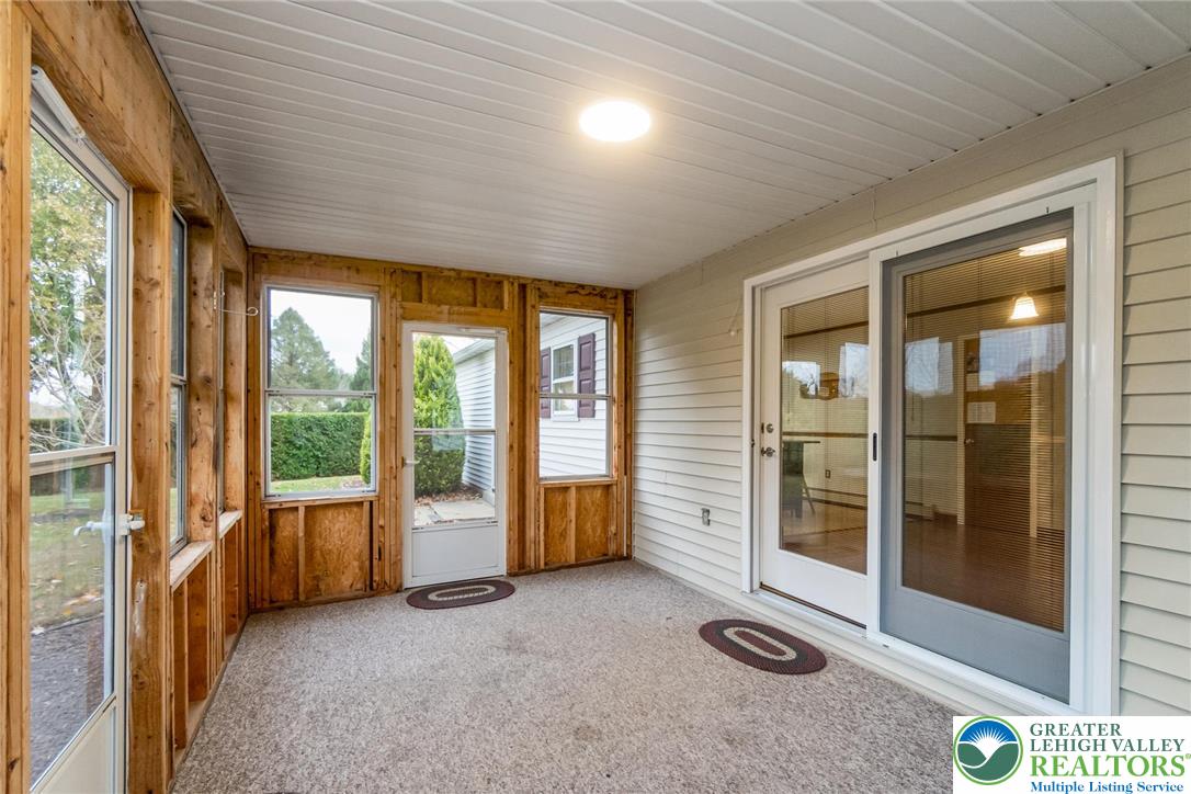 1053 Hilltop Road Leesport, PA 19533 - Photo 19 of 46 a view of an empty room with glass door