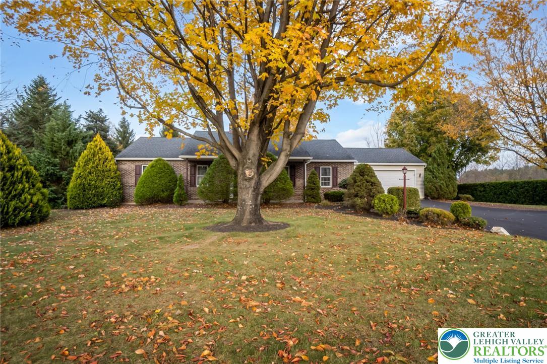 1053 Hilltop Road Leesport, PA 19533 - Photo 2 of 46 a front view of a house with a yard