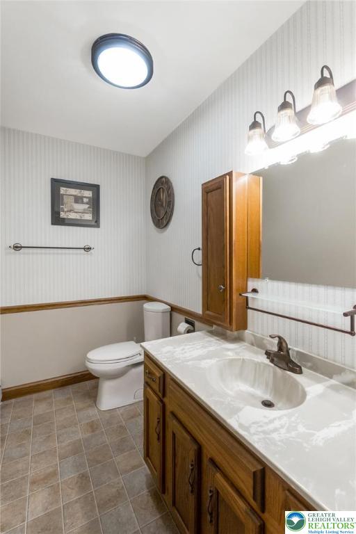 1053 Hilltop Road Leesport, PA 19533 - Photo 30 of 46 a bathroom with a sink and a mirror