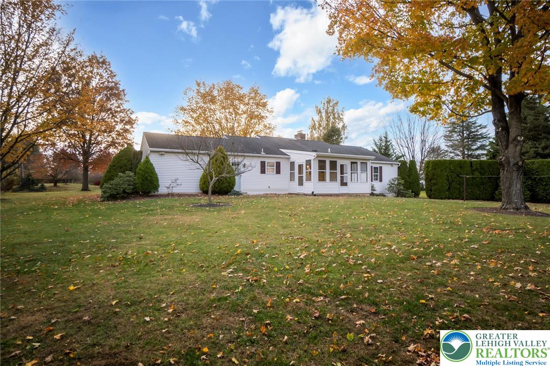 1053 Hilltop Road Leesport, PA 19533 - Photo 40 of 46 a view of a house with a yard