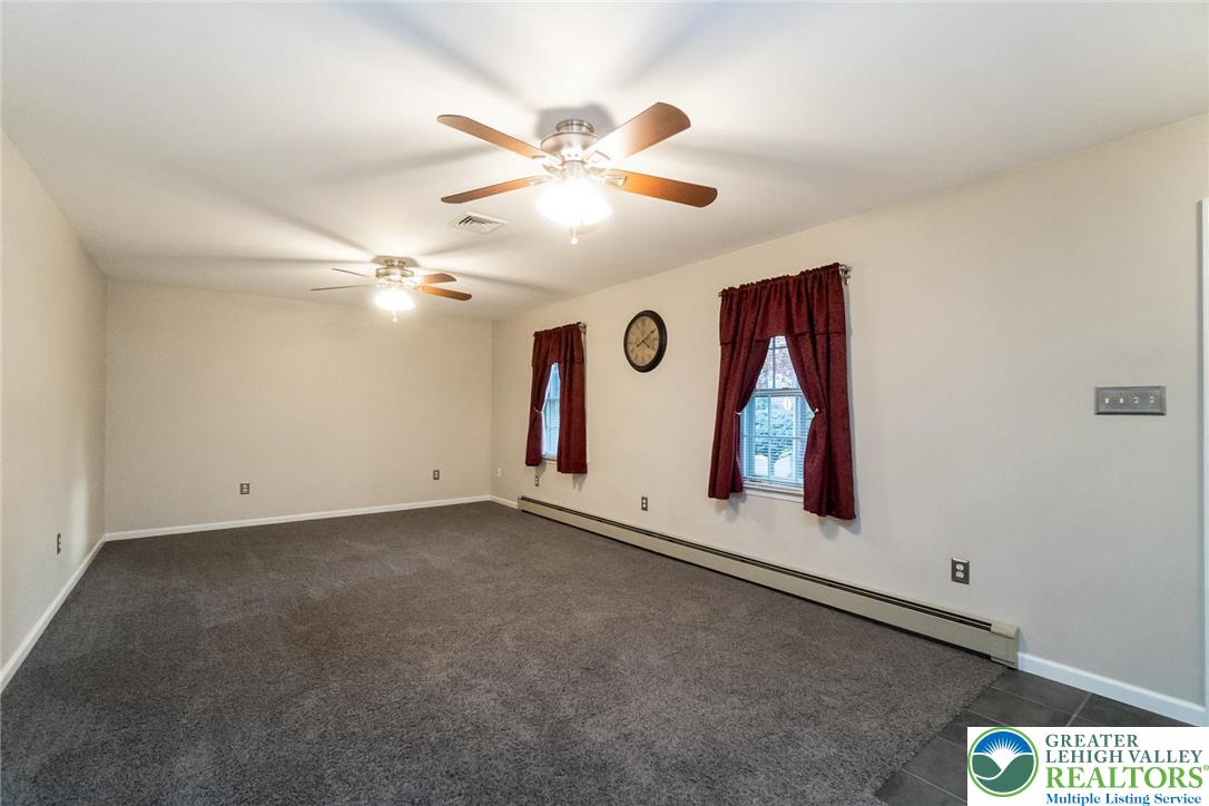 1053 Hilltop Road Leesport, PA 19533 - Photo 6 of 46 a view of an empty room with a window
