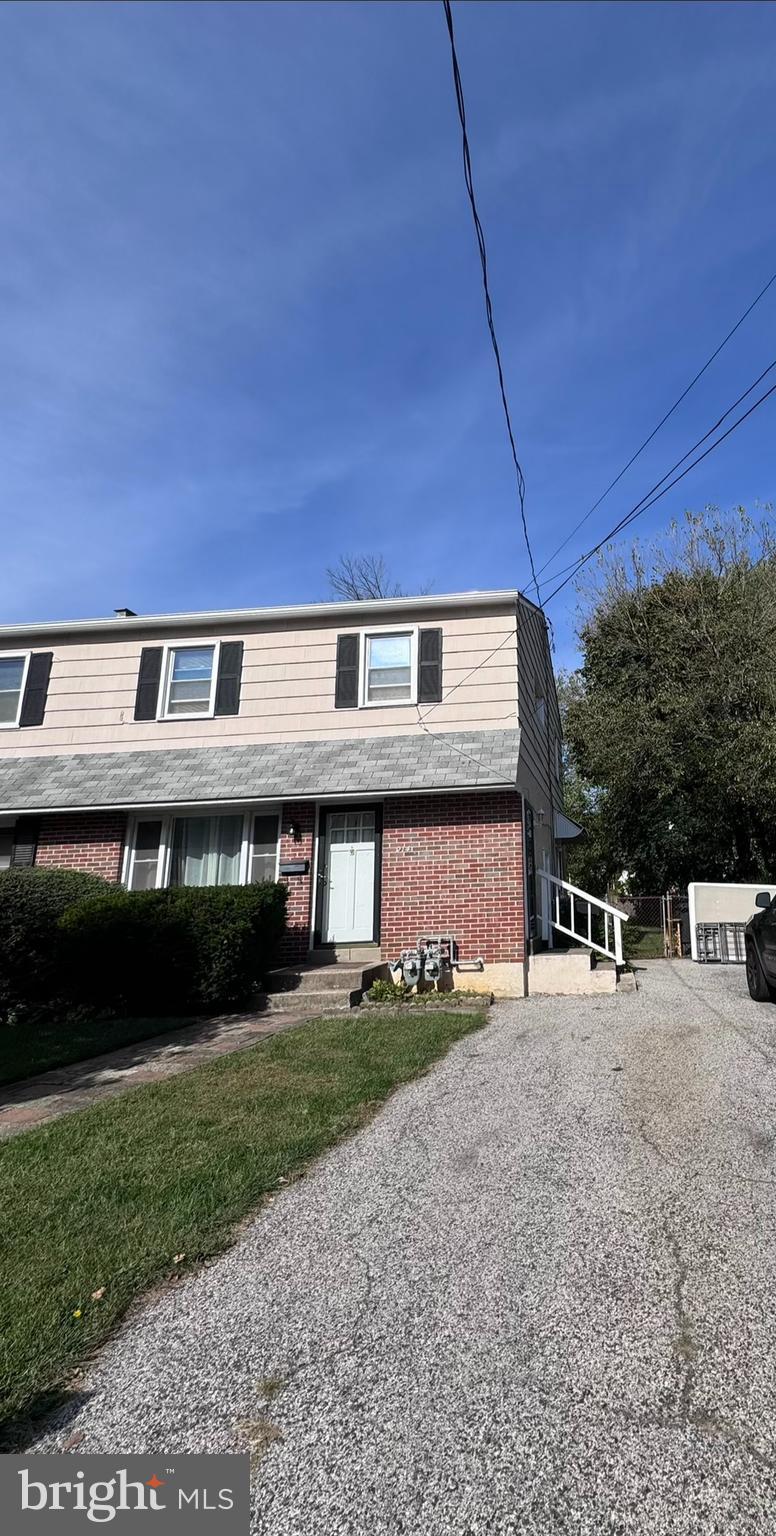 214 Bickley Road Glenside, PA 19038 - Photo 1 of 12 a front view of a house with a garden and yard