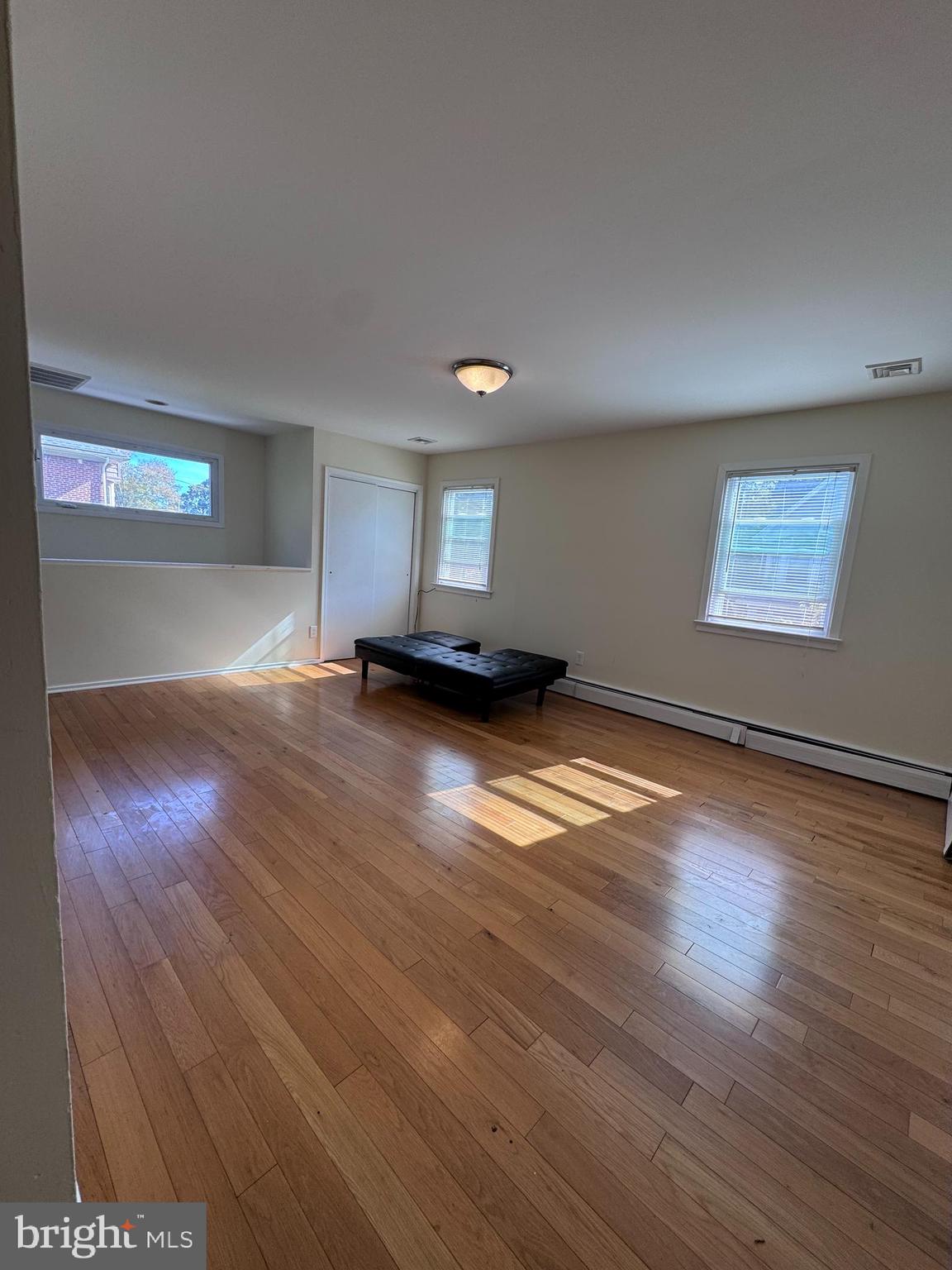 214 Bickley Road Glenside, PA 19038 - Photo 5 of 12 a view of empty room with wooden floor