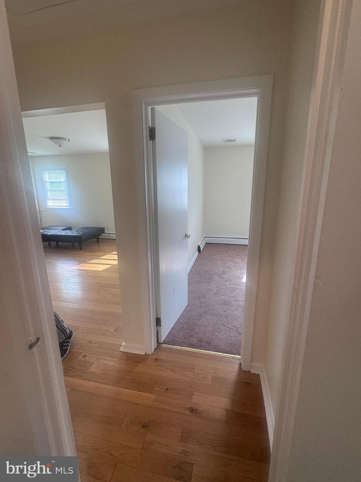 214 Bickley Road Glenside, PA 19038 - Photo 6 of 12 a view of a hallway with wooden floor