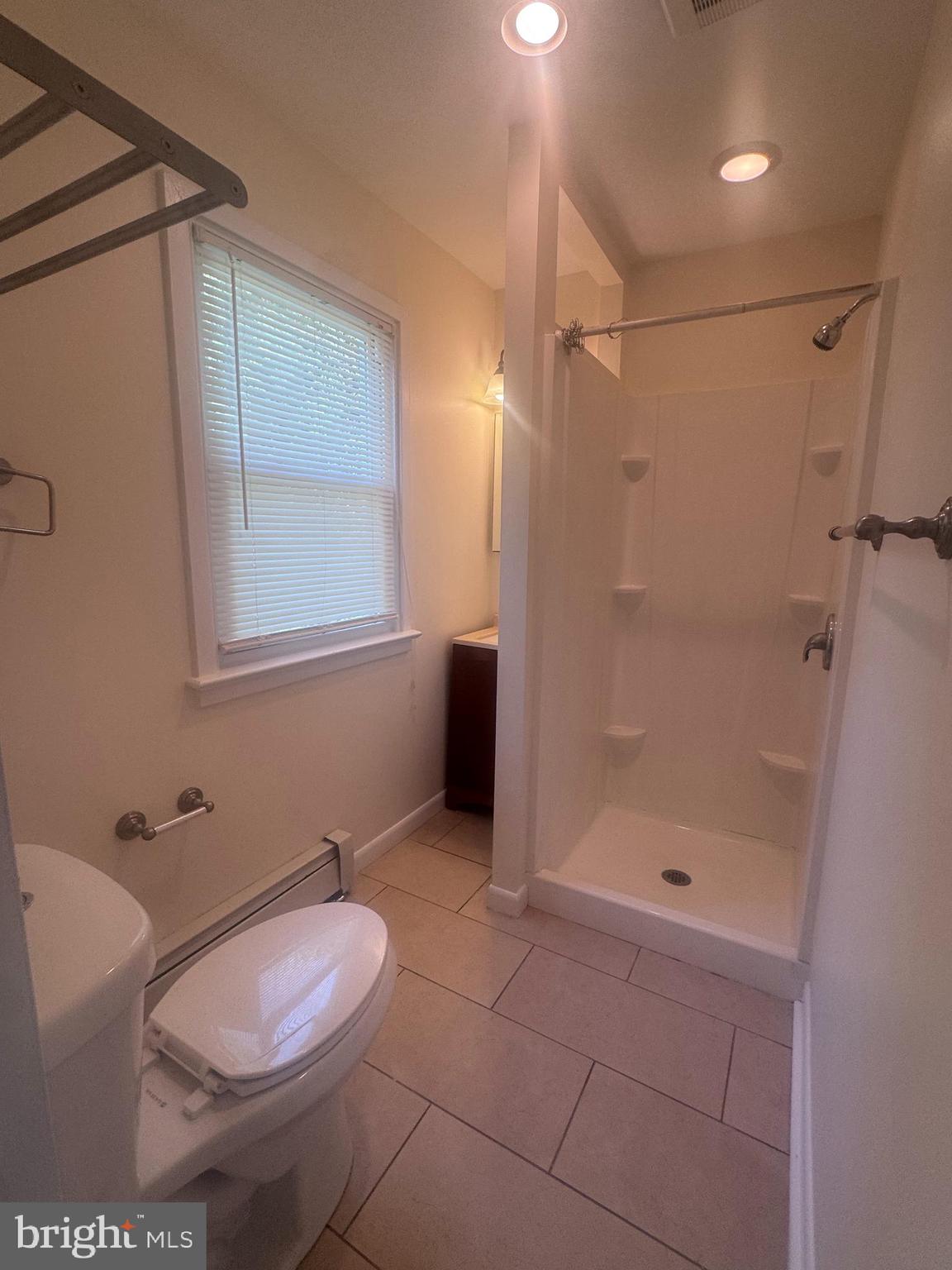 214 Bickley Road Glenside, PA 19038 - Photo 8 of 12 a bathroom with a toilet and shower