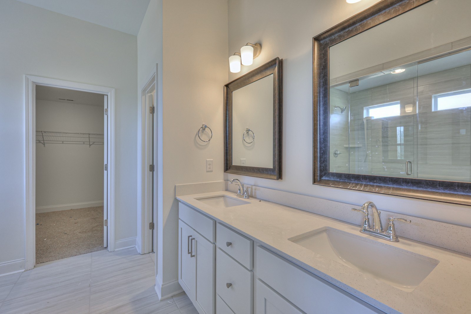 2014 Bennett Creek Road Columbia, TN 38401 - Photo 13 of 25 a bathroom with double vanity sinks and a mirror