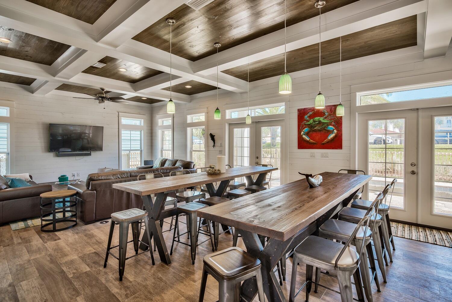 4488 Ocean View Drive Destin, FL 32541 - Photo 11 of 23 a view of a dining area with furniture window and wooden floor