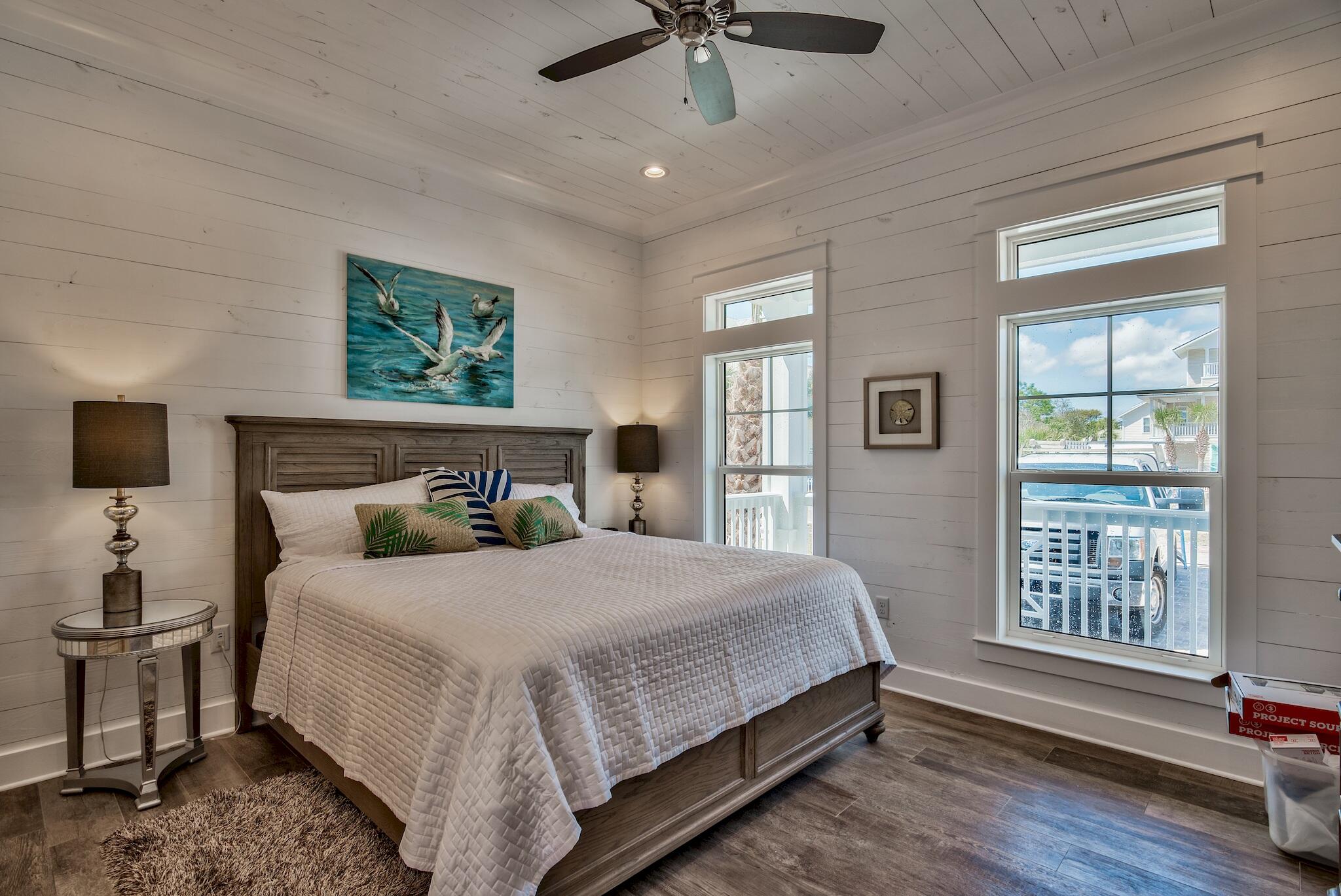 4488 Ocean View Drive Destin, FL 32541 - Photo 13 of 23 a bedroom with a bed and a window