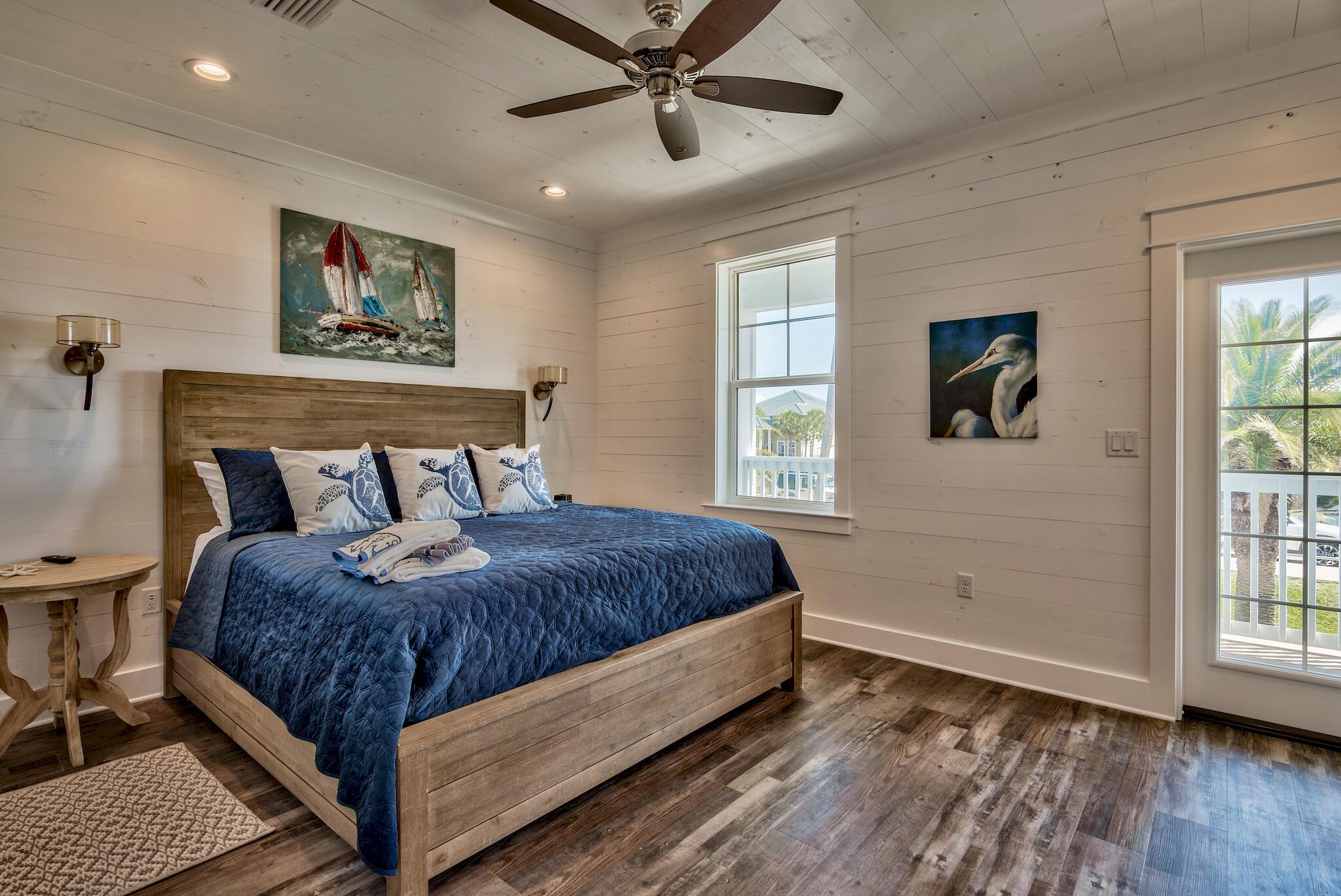 4488 Ocean View Drive Destin, FL 32541 - Photo 14 of 23 a bedroom with a large bed and a window