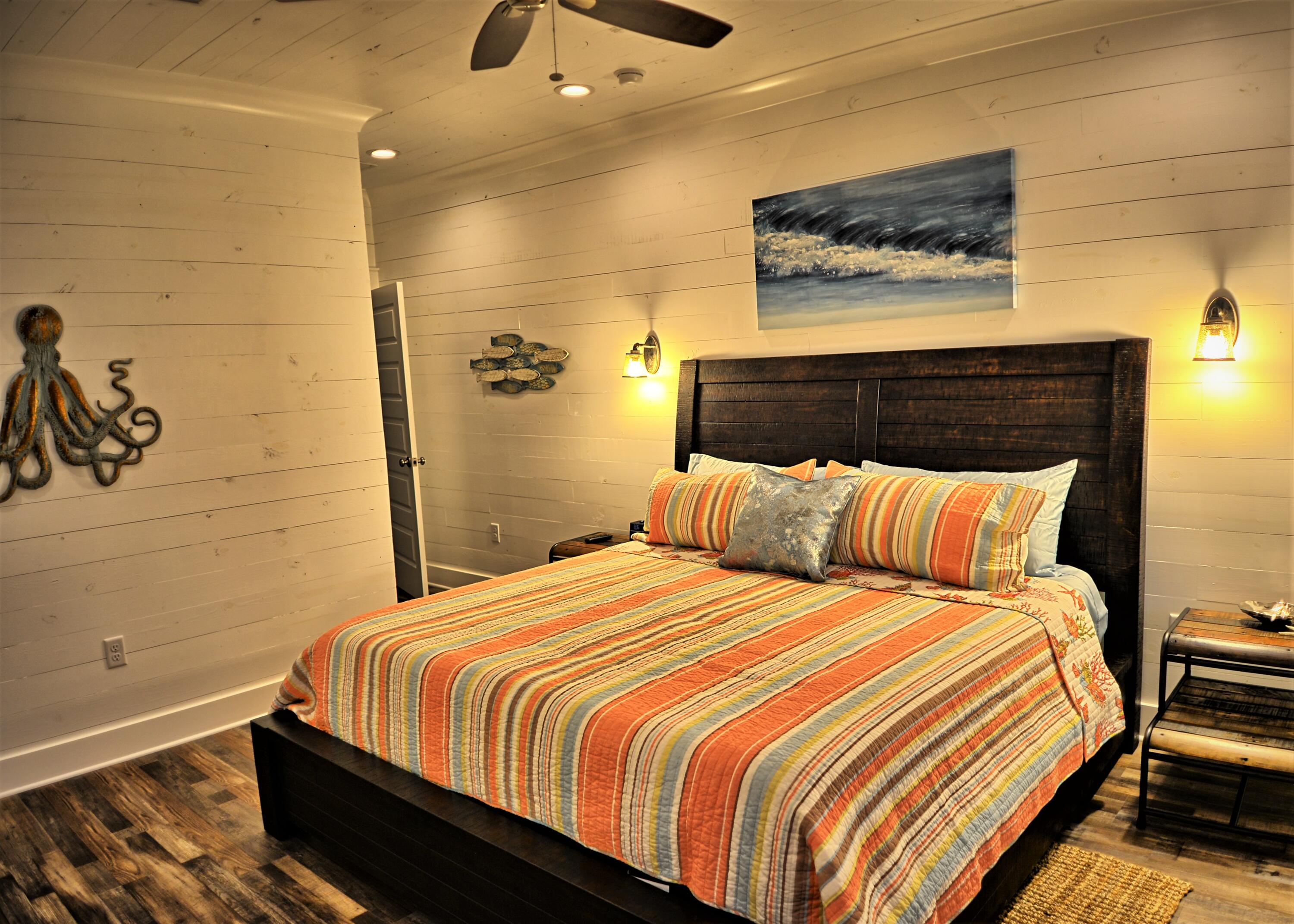 4488 Ocean View Drive Destin, FL 32541 - Photo 15 of 23 a bedroom with a bed and wall painting