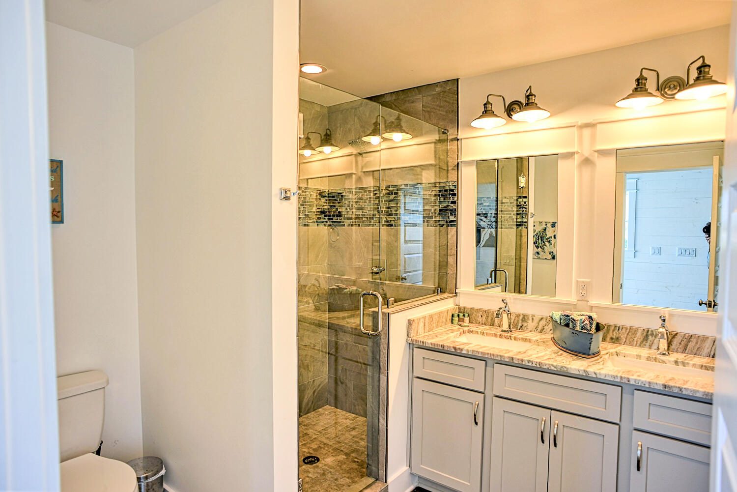 4488 Ocean View Drive Destin, FL 32541 - Photo 20 of 23 a bathroom with a sink and a mirror