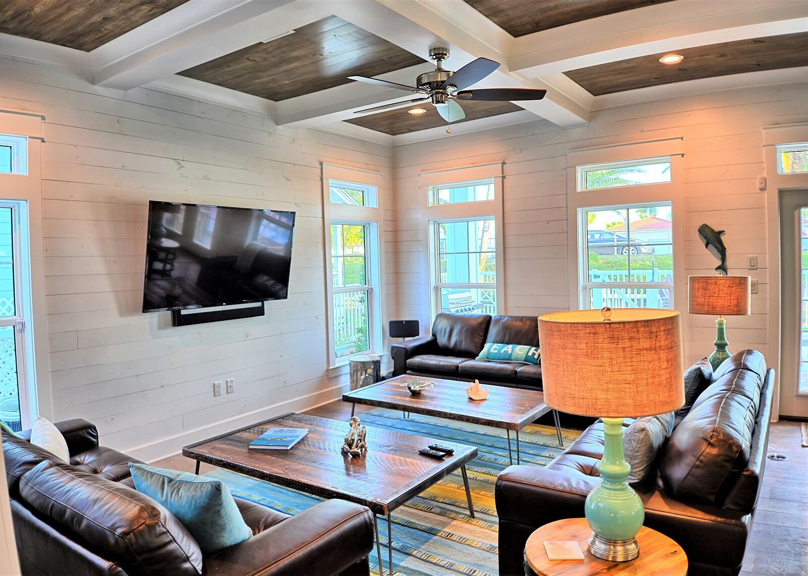4488 Ocean View Drive Destin, FL 32541 - Photo 10 of 23 a living room with furniture and a flat screen tv