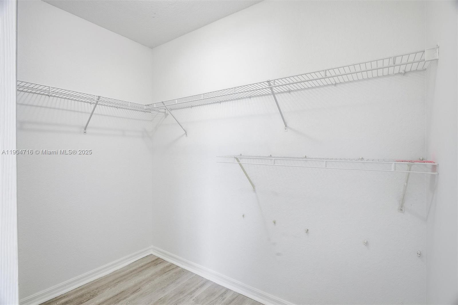 4628 Southwest 125th Lane Miramar, FL 33027 - Photo 27 of 44 a view of a room with racks on the wall