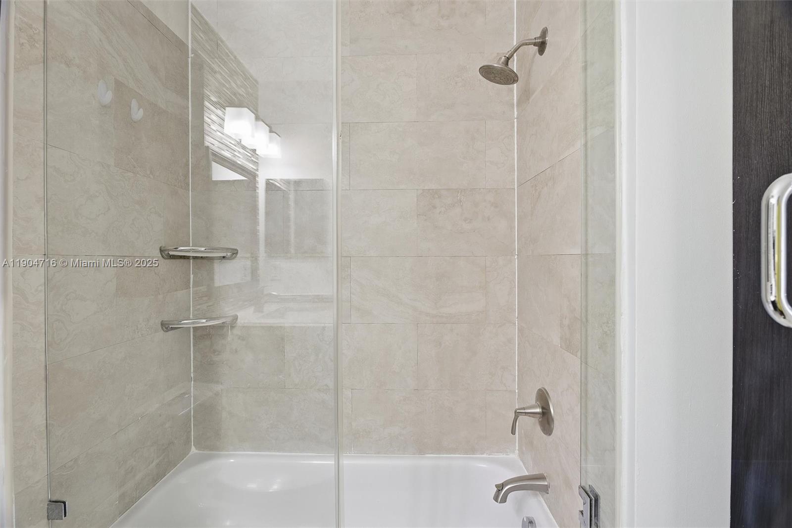 4628 Southwest 125th Lane Miramar, FL 33027 - Photo 35 of 44 a bathroom with a shower