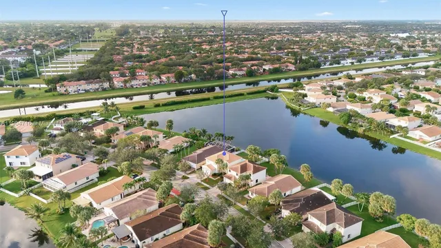 an aerial view of a city with ocean view