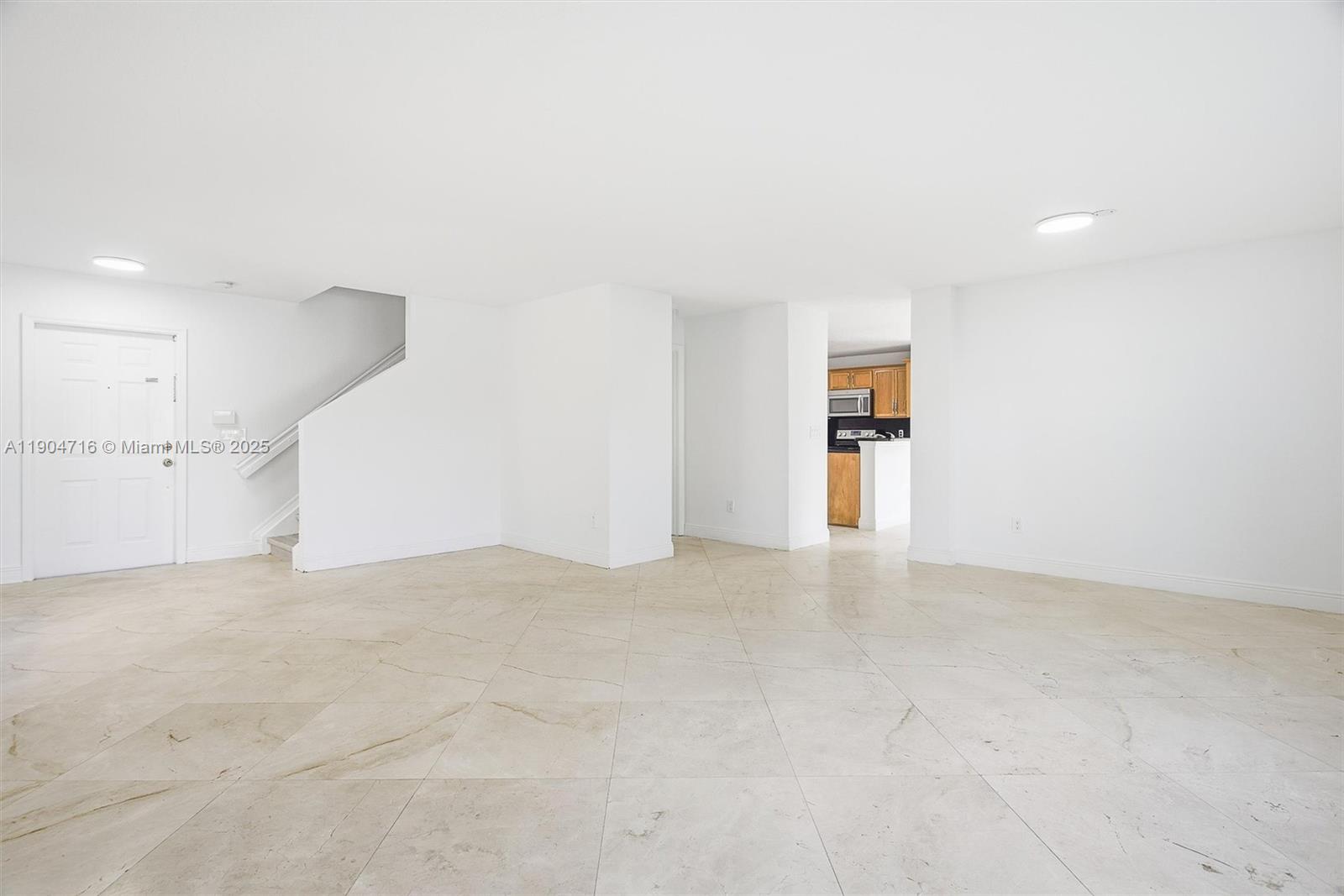 4628 Southwest 125th Lane Miramar, FL 33027 - Photo 9 of 44 a view of an empty room with kitchen