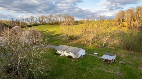 a view of a lake with a building in the background