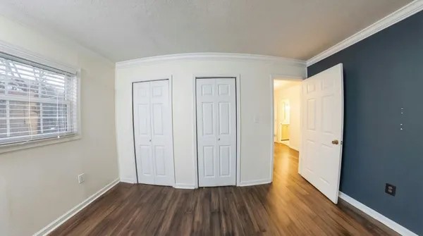 a view of hallway with natural light