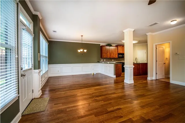 a view of a kitchen with a sink and a fireplace